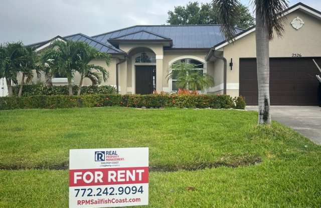 Convenient 3/2/2 PSL Home with Backyard Oasis! photos photos