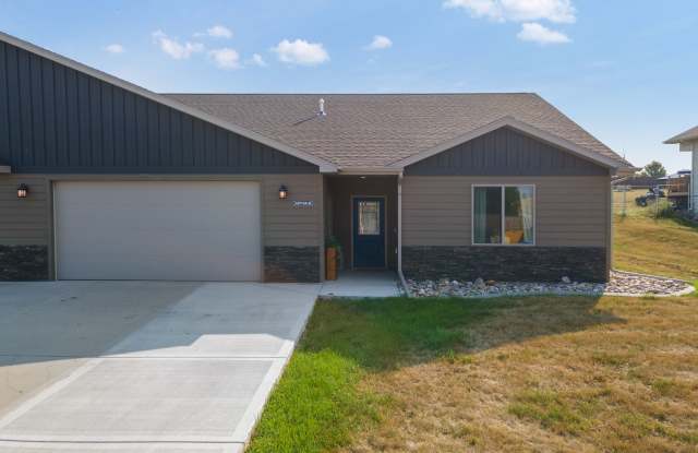 Stylish Living in a 3-Bed, 2-Bath Townhome with a 2-Car Garage Gallery 1