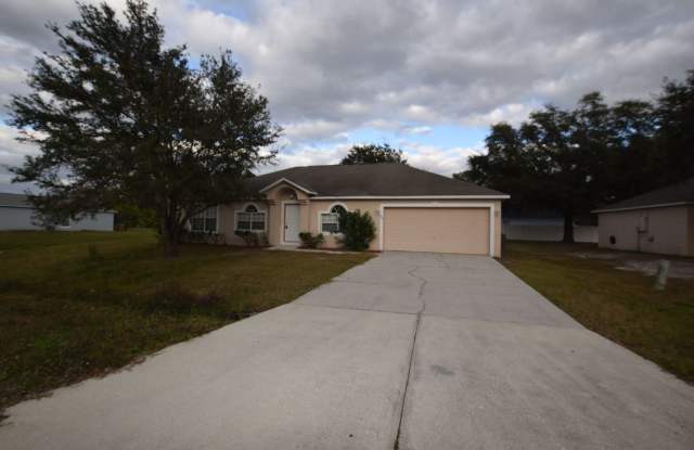 Beautiful 4 bedrooms/ 2 baths home with a 2 car garage for rent at 826 Halifax Dr. Kissimmee, FL 34758. photos photos