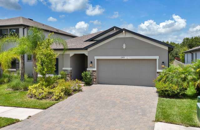 Well laid out 4 Beds/3Bths plus Den, screened Lanai on nature preserve in a well sort after K-Bar Range gated community! photos photos