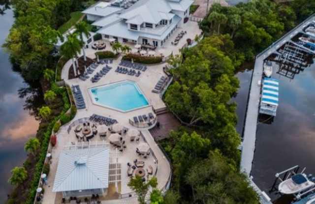 Beautifully Renovated Coach Home in Barbados at Tarpon Cove – Lake & Preserve Views! Gated Community | 2 Bedrooms + Cozy Den | 2 Bathrooms | Attached 1-Car Garage | 1,684 Sq. Ft. | Optional Club Membership Gallery 4