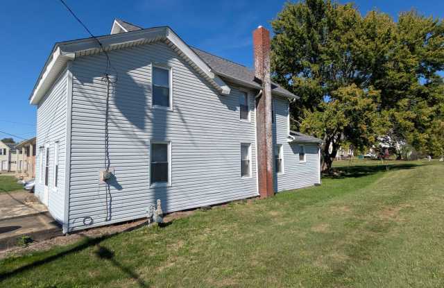 Welcome to this newly renovated, 4-bedroom, 1.5-bathroom home located in the charming town of Hartville Gallery 4