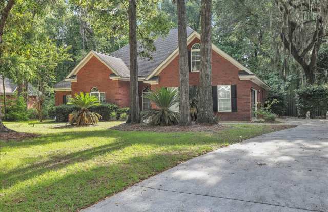 Stunning all-brick home on a large wooded lot photos photos