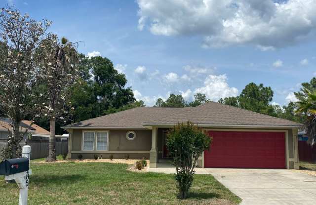 Immaculate 3/2 with garage and large yard photos photos