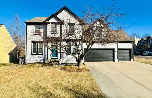 **BRAND NEW CARPETS** Beautiful Home in Blue Valley Schools w/ an Updated Kitchen, Fenced Yard, Finished Basement! photos photos