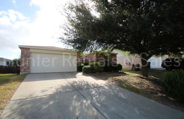 Charming 3-Bedroom Home with Fireplace, Spacious Primary Suite & Covered Deck Gallery 3