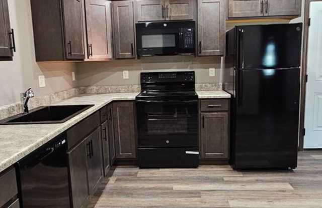 Newly constructed 2-bedroom, 1 bathroom, 2 car garage. Gallery 2