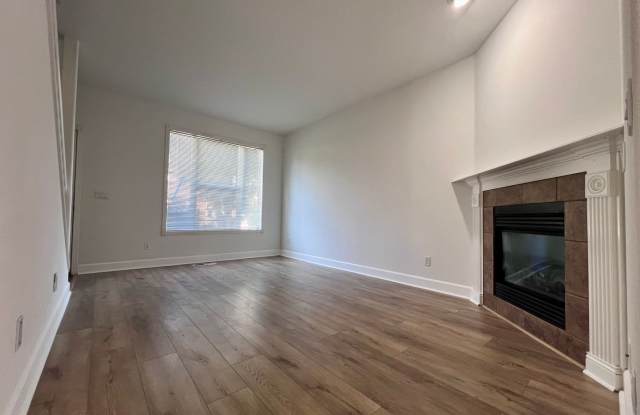 MOVE-IN SPECIAL – 1/2 Off First Month’s Rent! Charming 3-Bedroom End-Unit Townhome with Attached Garage & Private Yard! Gallery 4
