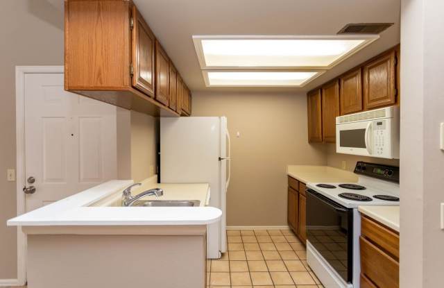 Cozy 2-Bed Condo with Fireplace, Garage  Pool Access Near Shopping! Gallery 3