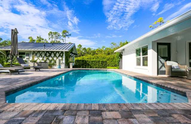 **STUNNING FURNISHED 5 BED\3 BATH PRIVATE POOL HOME WITH GUEST HOUSE**PRIVATE FULL TENNIS /PICKLEBALL COURT**FULLY FURNISHED**NORTH NAPLES** NO HOA SO MOVE IN FAST ** PET FRIENDLY ** photos photos
