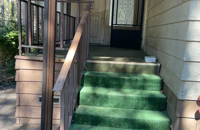 Magalia 2 bed 2 bath home + 2 bonus Rooms with detached garage and carport-partially fenced back yard Gallery 3