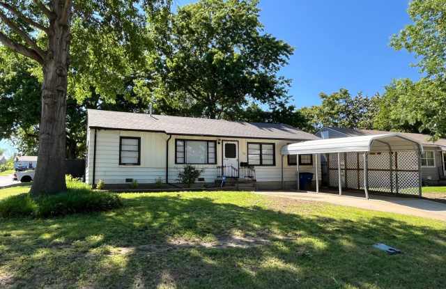 Step into this beautifully updated 1950's gem, where charm meets modern convenience photos photos