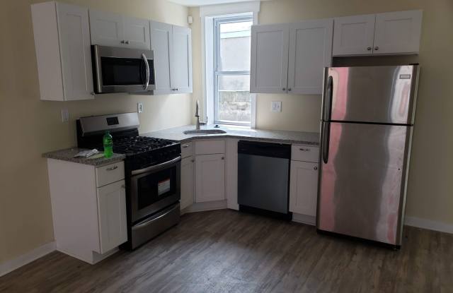 Charming 2-Bedroom Row Home with Modern Upgrades in Norris Square photos photos