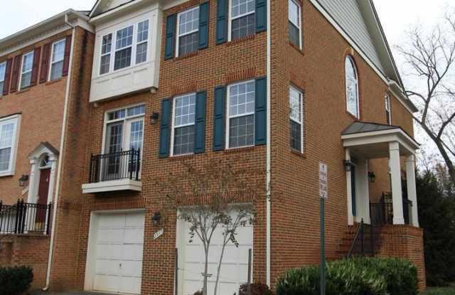 Discover this beautifully updated end unit townhome offering a perfect blend of style, comfort, and convenience. photos photos