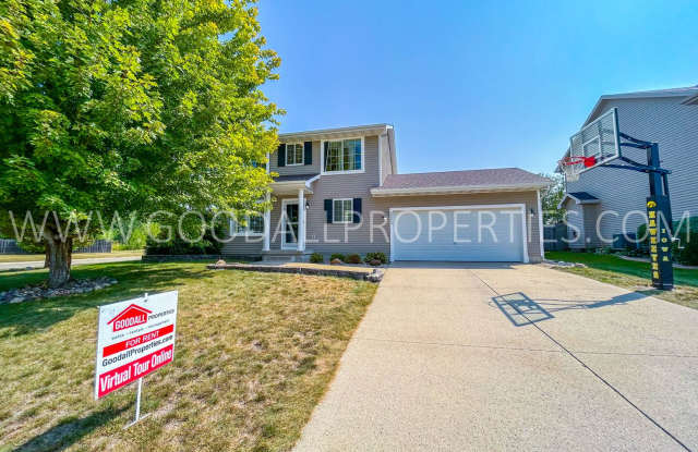 Charming 3-bedroom, 3-bath home with a fenced backyard and a partially finished basement. photos photos