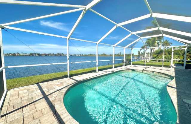 Beautiful Waterfront 3 Bed 2 Bath Home With Heated Pool, Washer/Dryer In Unit  More! photos photos
