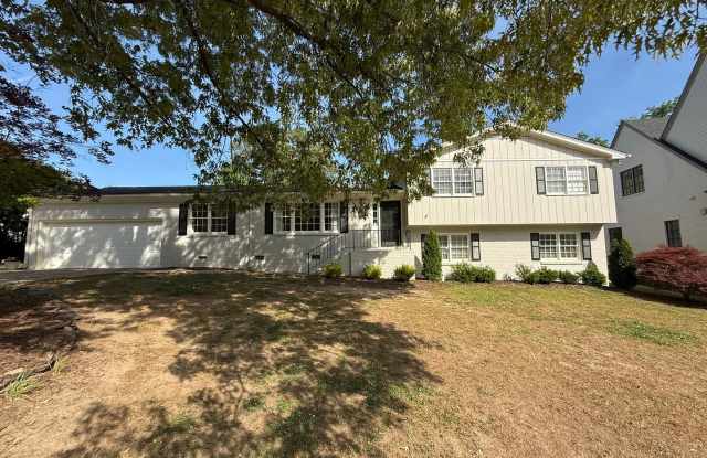 **OFFERING REFUNDABLE APPLICATION FEES & $250 MOVE IN PROMOTION** Stunning 5BD, 3BA North Ridge Raleigh Home on a Large, Private Lot in a Prime Location Near Ravenscroft, North Ridge Country Club, and Interstates photos photos