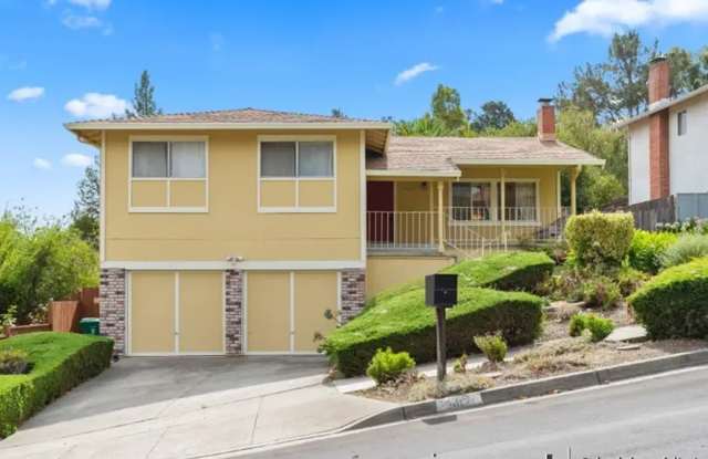 Stunning El Sobrante Hillside Home with Sweeping Views, Expansive Deck & Generous Yard Gallery 1