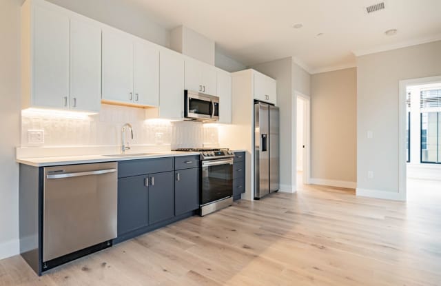 Modern 4.5 Bed/3 Bath in Allston with Washer and Dryer in Unit! photos photos