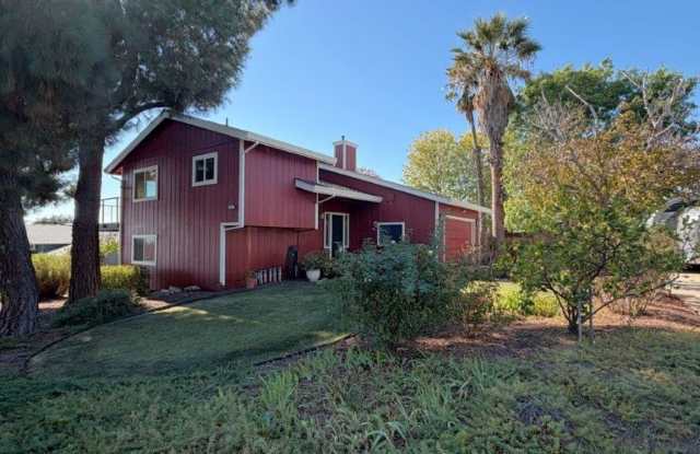 Beautiful 4-bedroom, 3-bath Tahoe-inspired home with vaulted ceilings, spacious decks, stunning downtown Concord views, and an oversized two-car garage Gallery 3