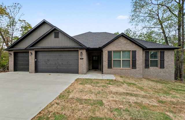Fabulous New Construction Rental in Bella Vista Featuring a Rare 3-Car Garage photos photos