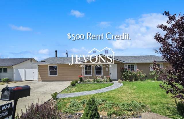 $500 Rent Credit | Spacious 4-bedroom home with fenced backyard and washer/dryer – Minutes from Yakima Valley College! photos photos