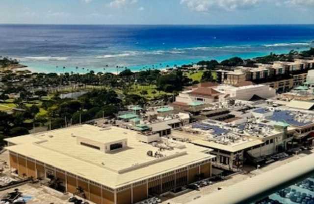 Modern end-unit with ocean views at Kapiolani Residence Gallery 4