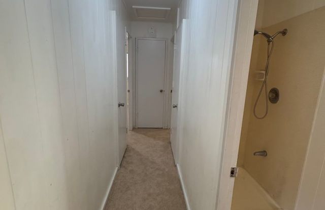 Spacious 3 bedroom, 1 bath home in Hawaii Kai with carport and big back yard! Gallery 1