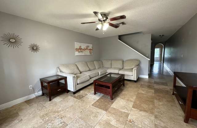 Beautiful Townhome in a gated community with assigned parking spots and a community pool Gallery 3
