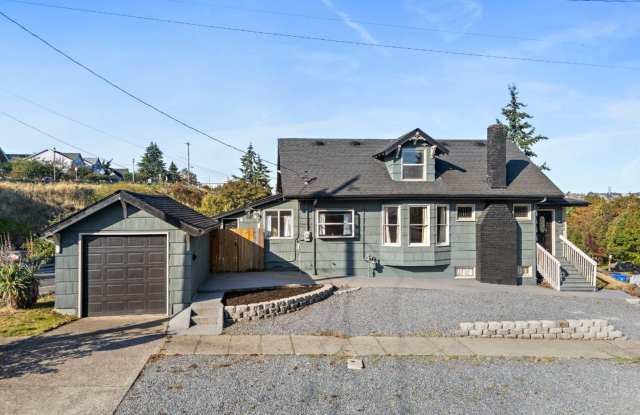 Charming 2-Bed 2-Bath Tacoma Craftsman | Sunroom, Large Basement  Quartz Counters photos photos Charming 2-Bed 2-Bath Tacoma Craftsman | Sunroom, Large Basement  Quartz Counters photos photos