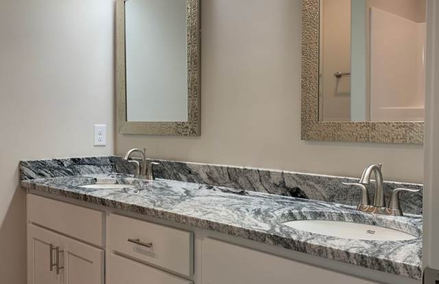 Zero entry ranch townhome with 2 stall garage. Spacious 2 bedrooms with walk in closets, 2.5 bathroom, 1st floor laundry photos photos