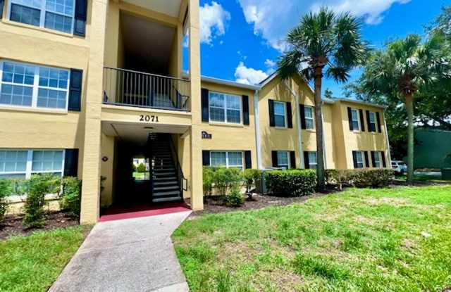 MOVE IN NOW!! Gated community Miriada! 1st floor 1X1.5 bath condo near pool area!!! Laminate wood flooring in living area and carpet in bedroom! Has washer  dryer! Gas stove  water heater! photos photos