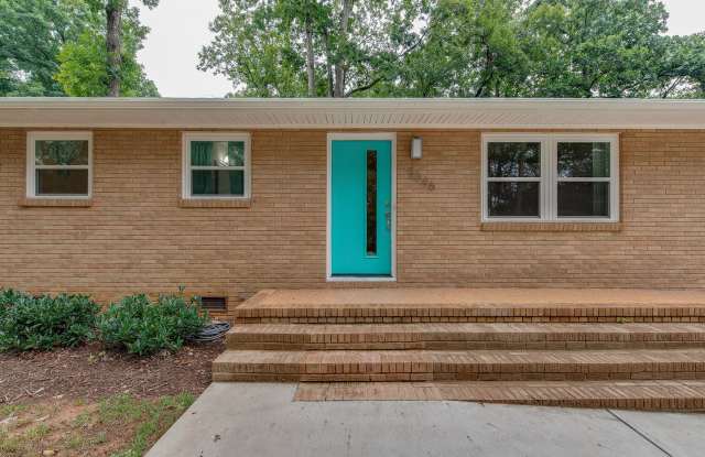 Discover the epitome of stylish living in this meticulously updated mid-century brick ranch, now available for rent. photos photos