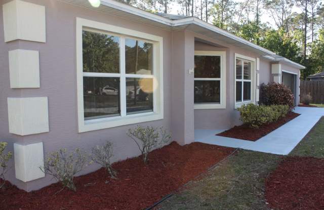 Unique 2/2/2 with Air-Conditioned Florida Room! Gallery 3