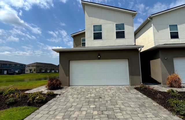 Beautiful end-unit townhouse located in the desirable Spring Isle Palms Community! photos photos