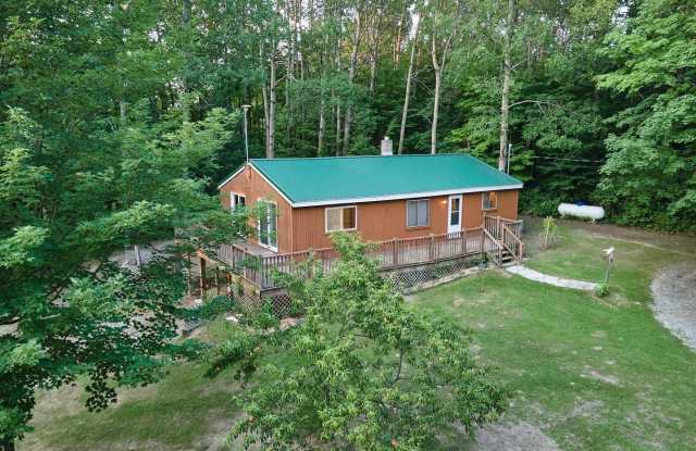 3 bedroom on 2.24 acres with a creek and pond in Howard City! photos photos