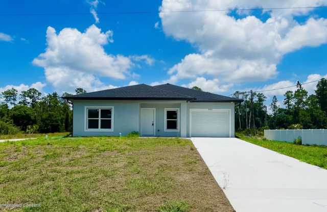MOVE IN SPECIAL- ONE MONTH FREE!!-BRAND NEW 2/2/1-EAST LEHIGH ACRES photos photos