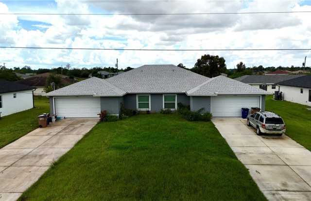 1582 Gretchen Avenue S - 1582 Gretchen Avenue South, Lehigh Acres, FL 33973