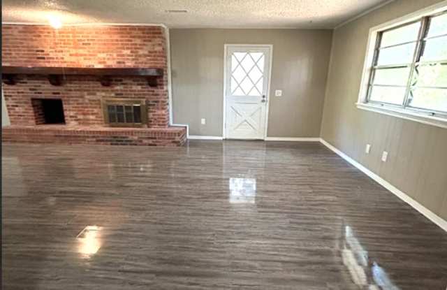 Spacious 5-Bedroom Home with Modern Updates and a Cozy Fireplace Gallery 3