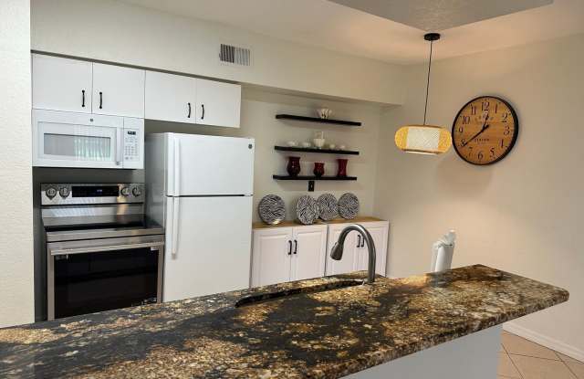 Unfurnished 1 X 1 first floor in desirable area of Bonita Springs Gallery 1