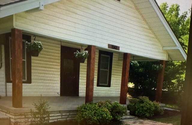 Charming 2 bed 2 bath 1 car garage AND 2 CAR CARPORT!!  Modern Farmhouse with Glassed in Sunroom! photos photos