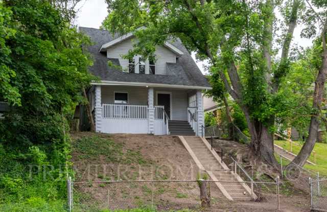 Park-Front Renovated 3BR/1BA with Huge Porch & 3-Car Garage! -415 Elgin Ave NW Gallery 1