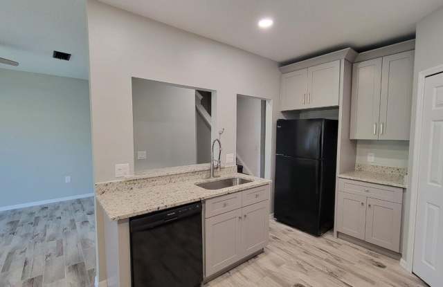 Annual Updated Townhome, with Two bedrooms, 2.5 Bath and a one Car Garage in Greenbrook Gallery 4