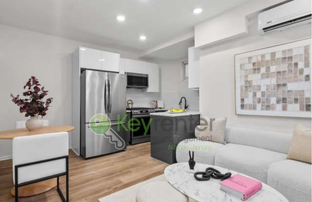 Rare Renovated 3BR/2BA Townhouse with Private Yard & NYC Views photos photos