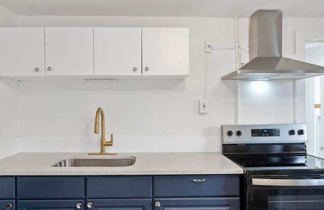 Renovated 3-Bedroom Apartment with Bonus Finished Attic & Spacious Shared Backyard Gallery 3