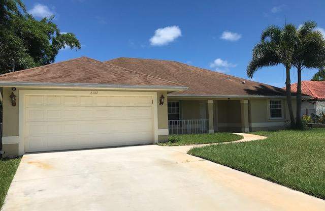 6102 Myrtle Drive - 6102 Myrtle Drive, Indian River Estates, FL 34982