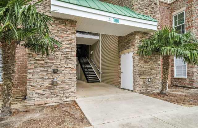 Don't miss this 4-bed, 3-bath condo TWO miles from the ocean! photos photos