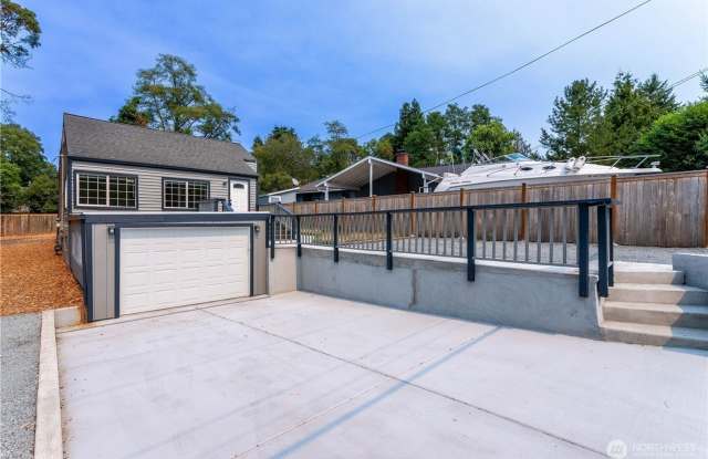 Beautifully Renovated 4-Bedroom Home in Desirable Arbor Heights! photos photos
