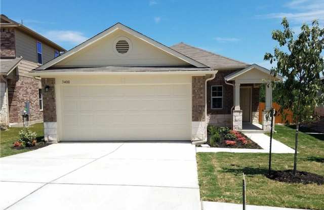 This 3 bedroom, 2 bath, two car garage Redwood home backs up to a mature tree-lined creek! - 3400 Ortman Drive, Austin, TX 78660