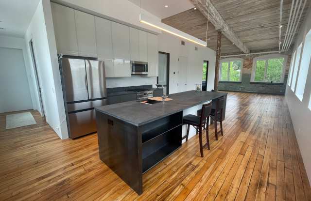 Historic Charm, Modern Luxury,  2 bedroom condo at Greylock Works! Gallery 1